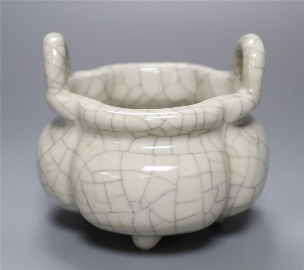 A Chinese crackle glaze tripod censer, Qianlong mark, diameter 13cm